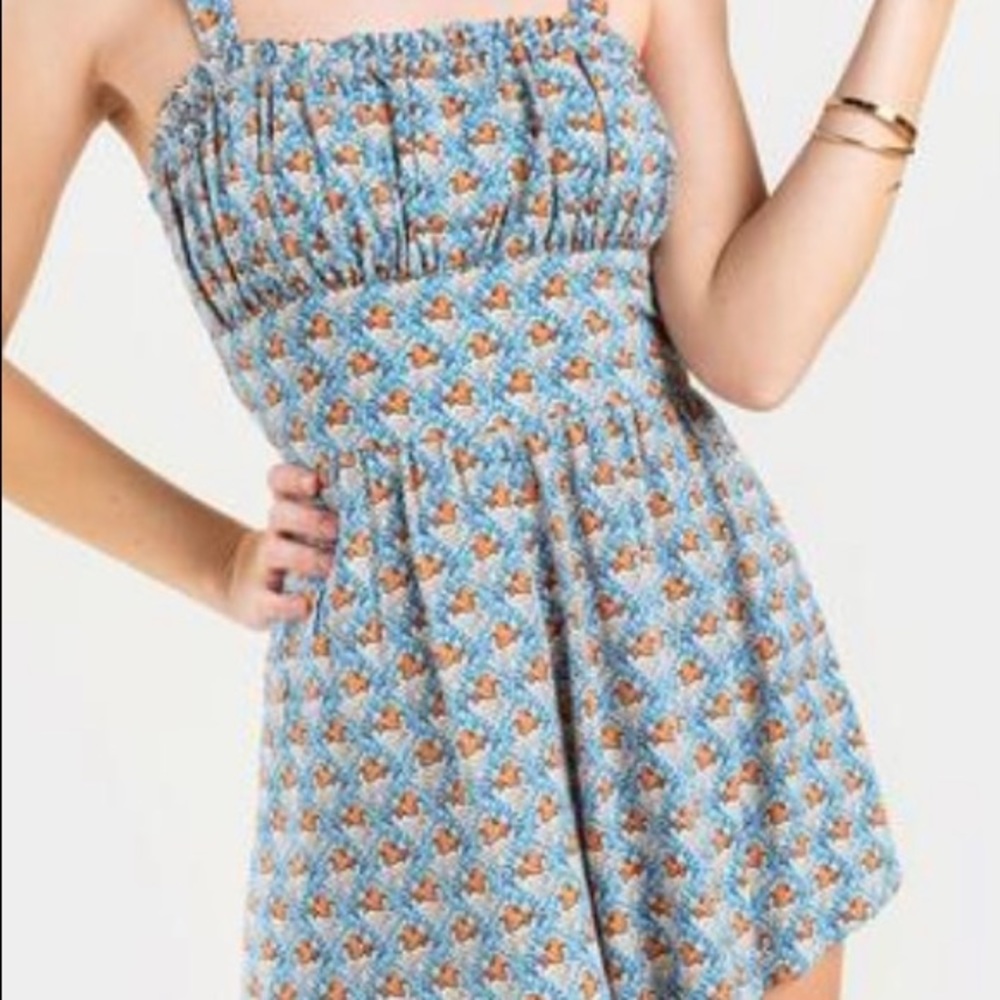 Francesca’s Collections Sage Mixed Print Romper by Trixxi